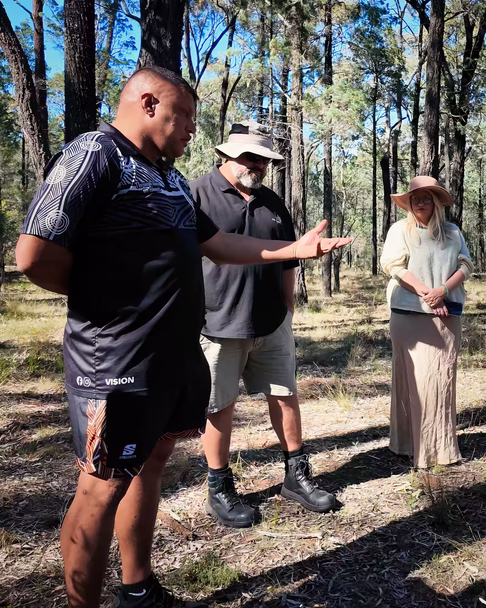A Dinawan's Connection member running a cultural workshop in the bush